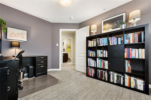 view of carpeted home office