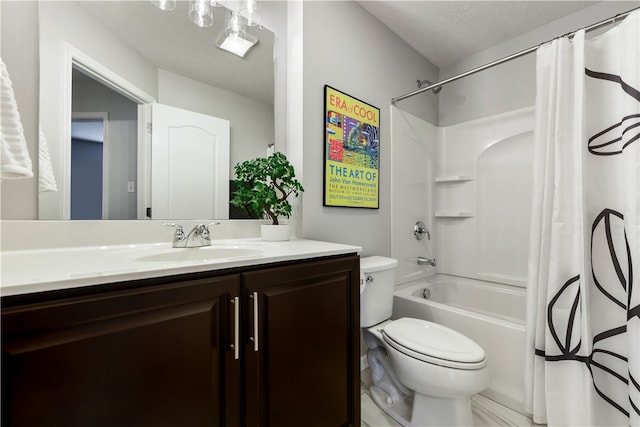 full bathroom with vanity, shower / bath combination with curtain, toilet, and a textured ceiling