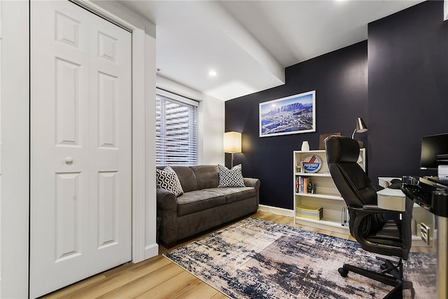 office area with hardwood / wood-style floors