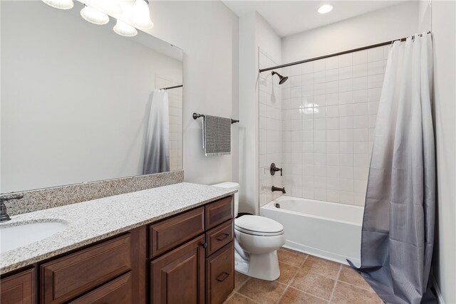 full bathroom featuring shower / tub combo, vanity, and toilet