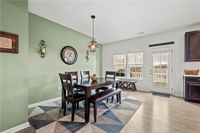 dining room featuring light hardwood / wood-style flooring