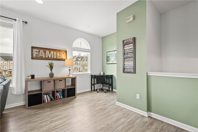 living area with light wood-type flooring