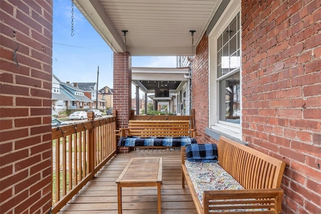 balcony featuring a porch