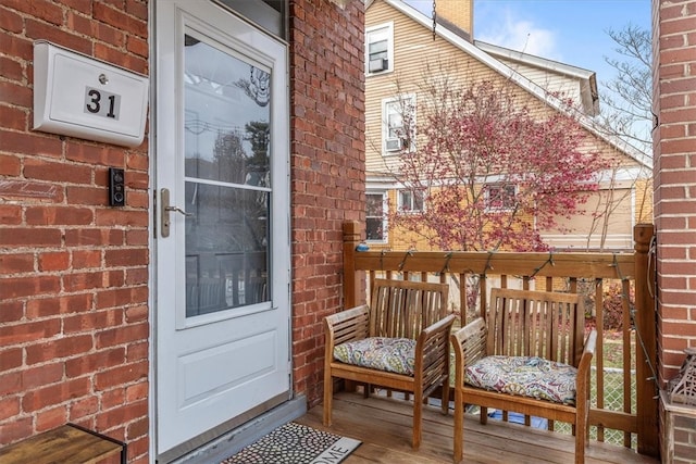 property entrance with covered porch