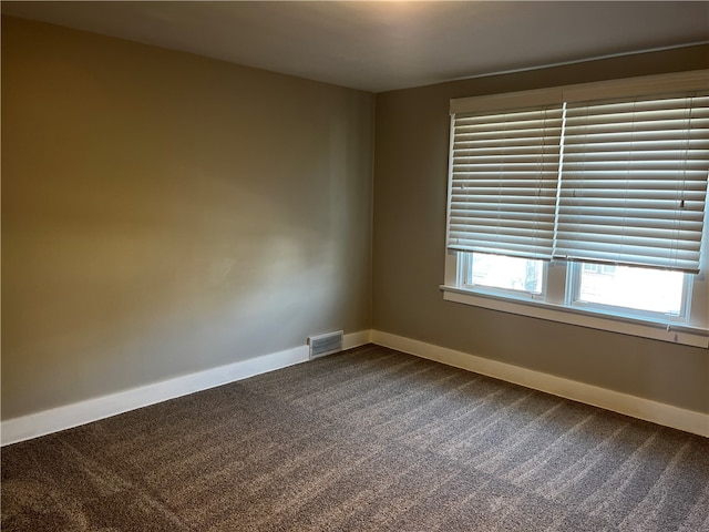 empty room with carpet floors