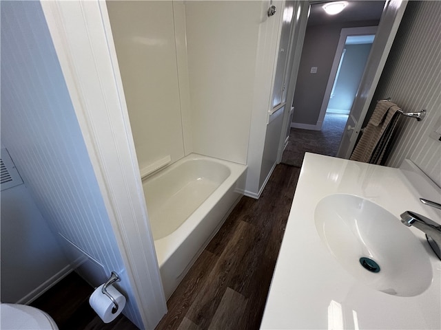 bathroom featuring vanity and wood-type flooring