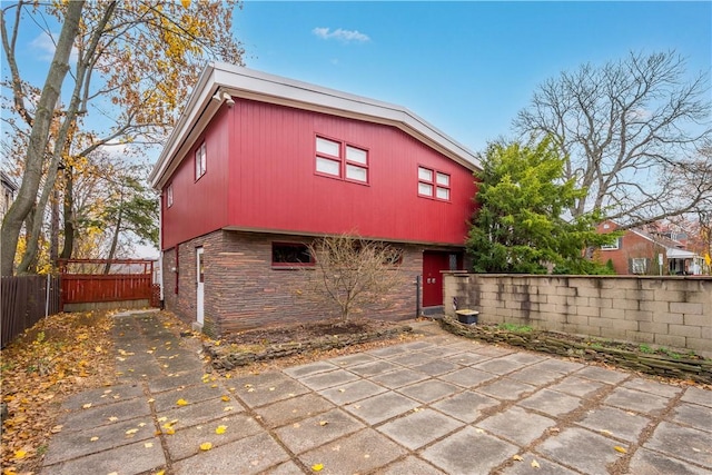 rear view of house with a patio