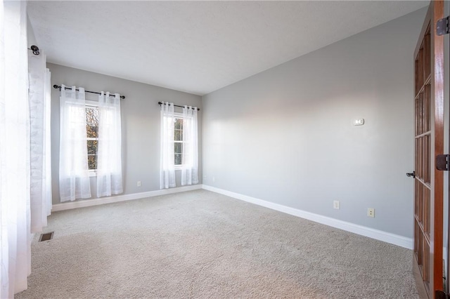 unfurnished room with carpet