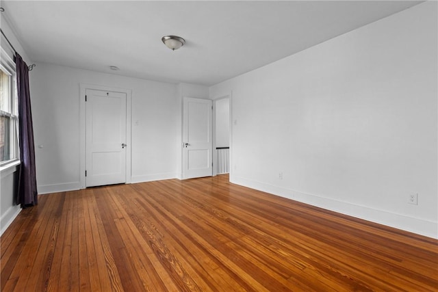 unfurnished bedroom featuring hardwood / wood-style floors