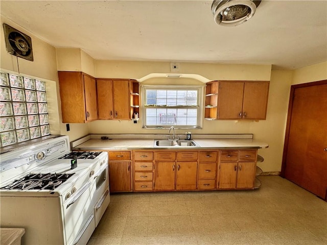 kitchen with gas range gas stove and sink