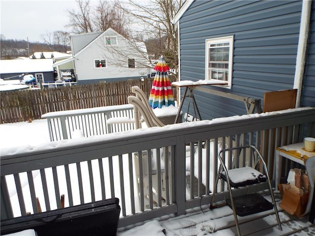 view of snow covered deck