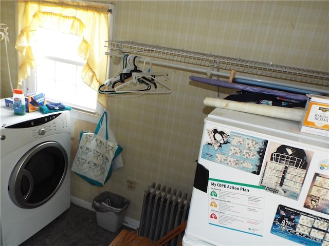 washroom featuring washer / dryer and radiator