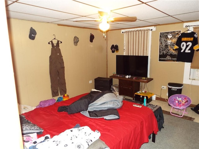 bedroom with ceiling fan and carpet floors