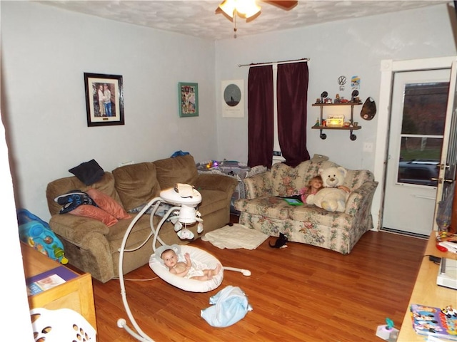 409 1st St, East Bethlehem, PA 15368 - living area with ceiling fan and wood finished floors