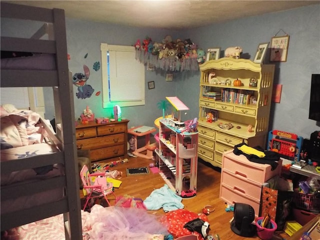 bedroom with light wood-type flooring