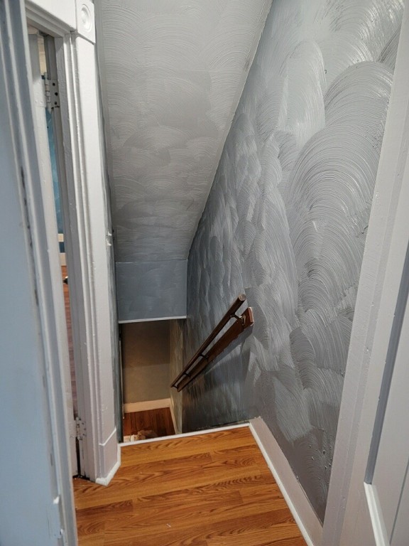 409 1st St, East Bethlehem, PA 15368 - staircase with wood finished floors