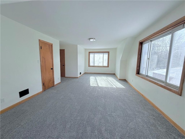 view of carpeted spare room