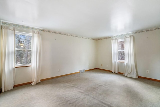 view of carpeted spare room