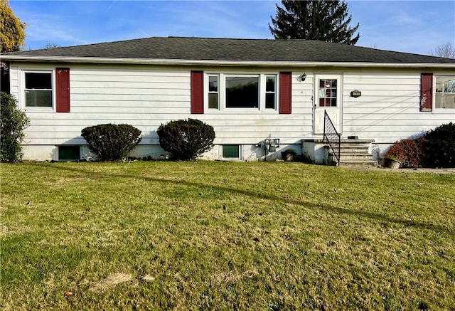 single story home featuring a front yard