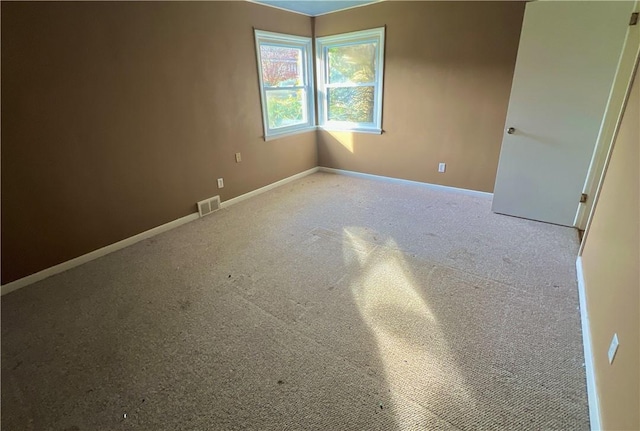 view of carpeted spare room