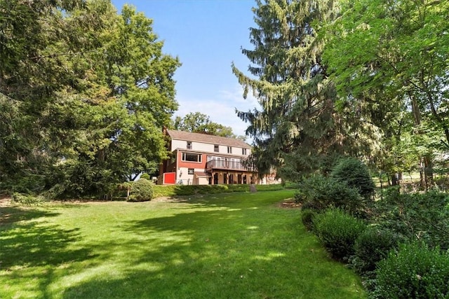 view of yard featuring a deck