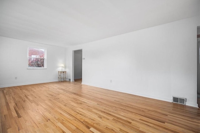 empty room with light wood-type flooring