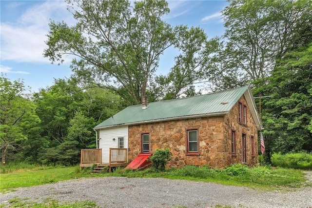 rear view of house with a deck