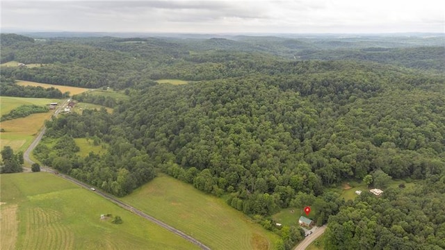 birds eye view of property featuring a rural view