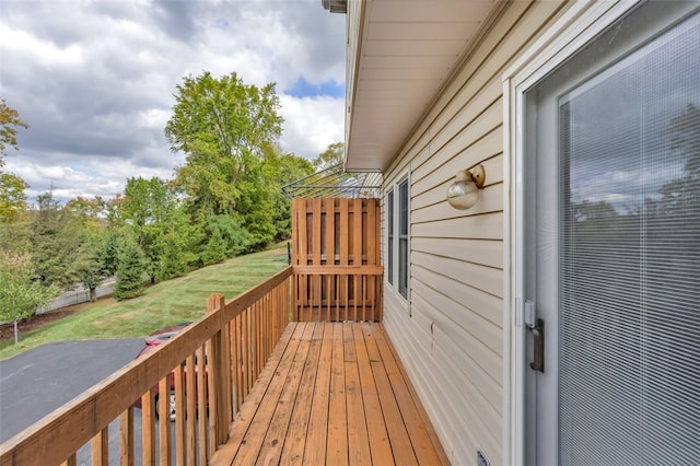 deck featuring a yard