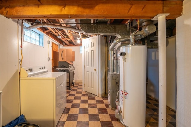 basement featuring gas water heater and washer / clothes dryer