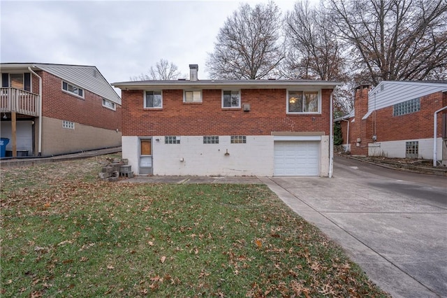 back of house with a garage