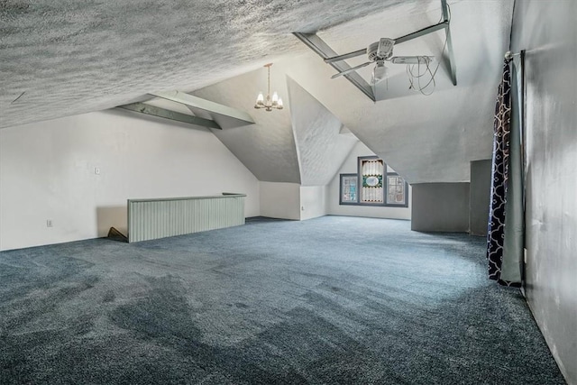 bonus room featuring vaulted ceiling, carpet, and a textured ceiling