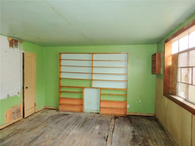 empty room featuring hardwood / wood-style flooring