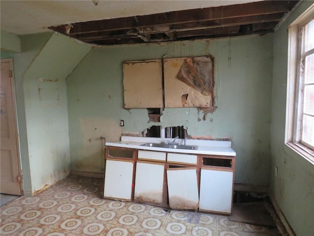 3104 Miles Ave, Clairton, PA 15025 - kitchen with a sink, light countertops, and light floors