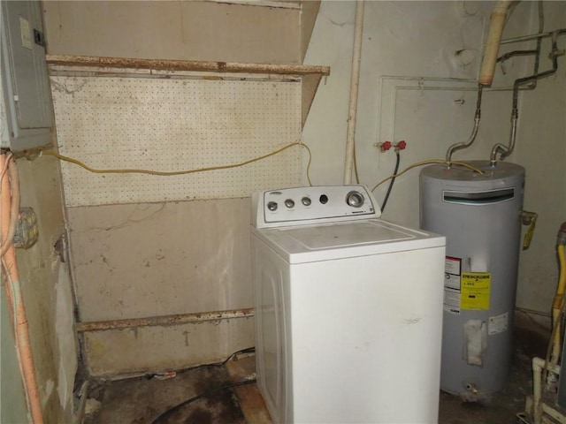 washroom with electric water heater and washer / clothes dryer