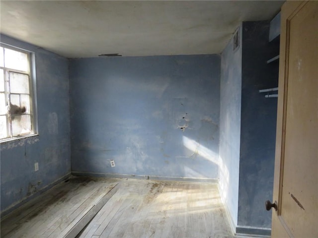 empty room featuring light hardwood / wood-style floors