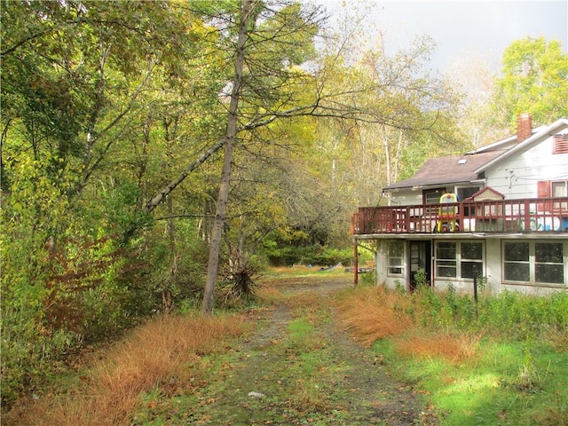 view of yard featuring a deck