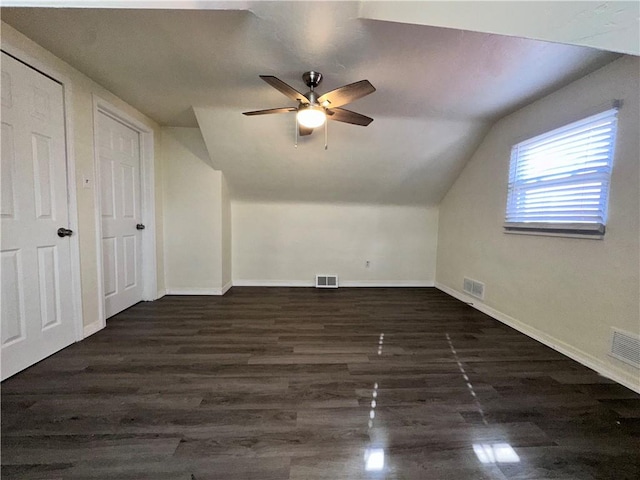 bonus room featuring ceiling fan, dark hardwood / wood-style flooring, and vaulted ceiling