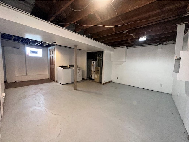 basement featuring washing machine and clothes dryer