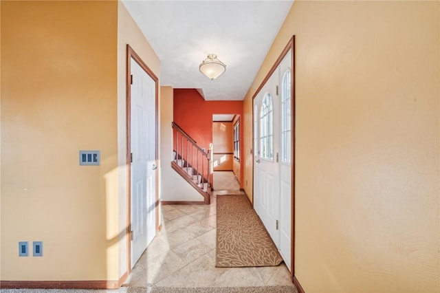 interior space with light tile patterned floors