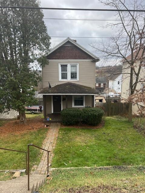 1808 Nash Ave, Penn Hills, PA 15235 - view of front property with covered porch and a front lawn