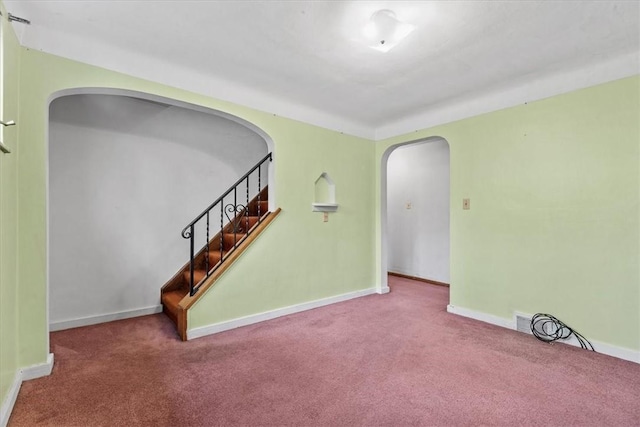 spare room featuring carpet floors