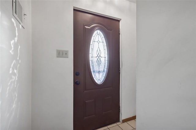 view of tiled entrance foyer