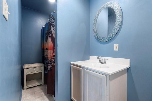 bathroom featuring tile patterned floors and vanity