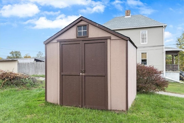 view of outdoor structure featuring a yard