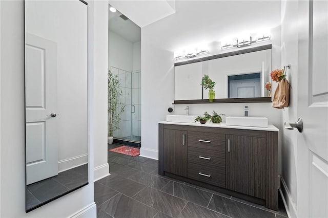 bathroom with vanity and walk in shower