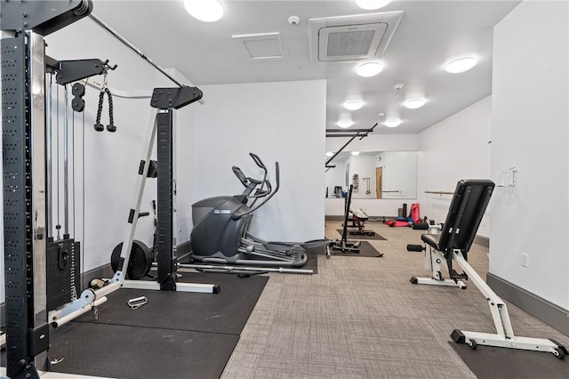 workout area featuring carpet floors