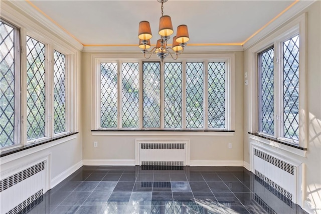 unfurnished sunroom with radiator and an inviting chandelier