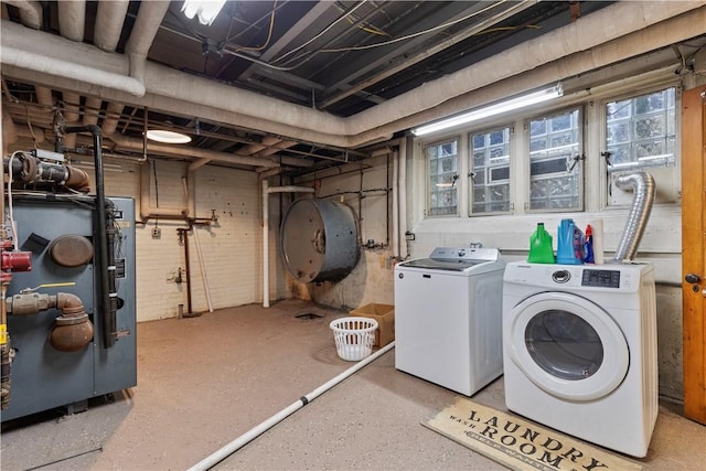 laundry room featuring separate washer and dryer