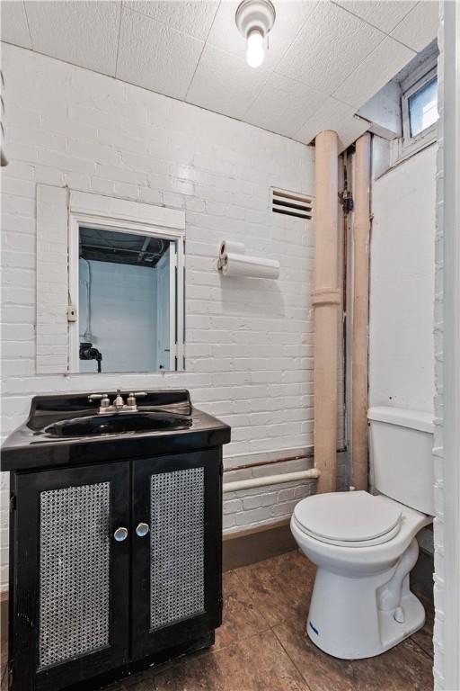 705 E Beau St E, Washington Boro, PA 15301 - half bath featuring vanity and tile patterned floors